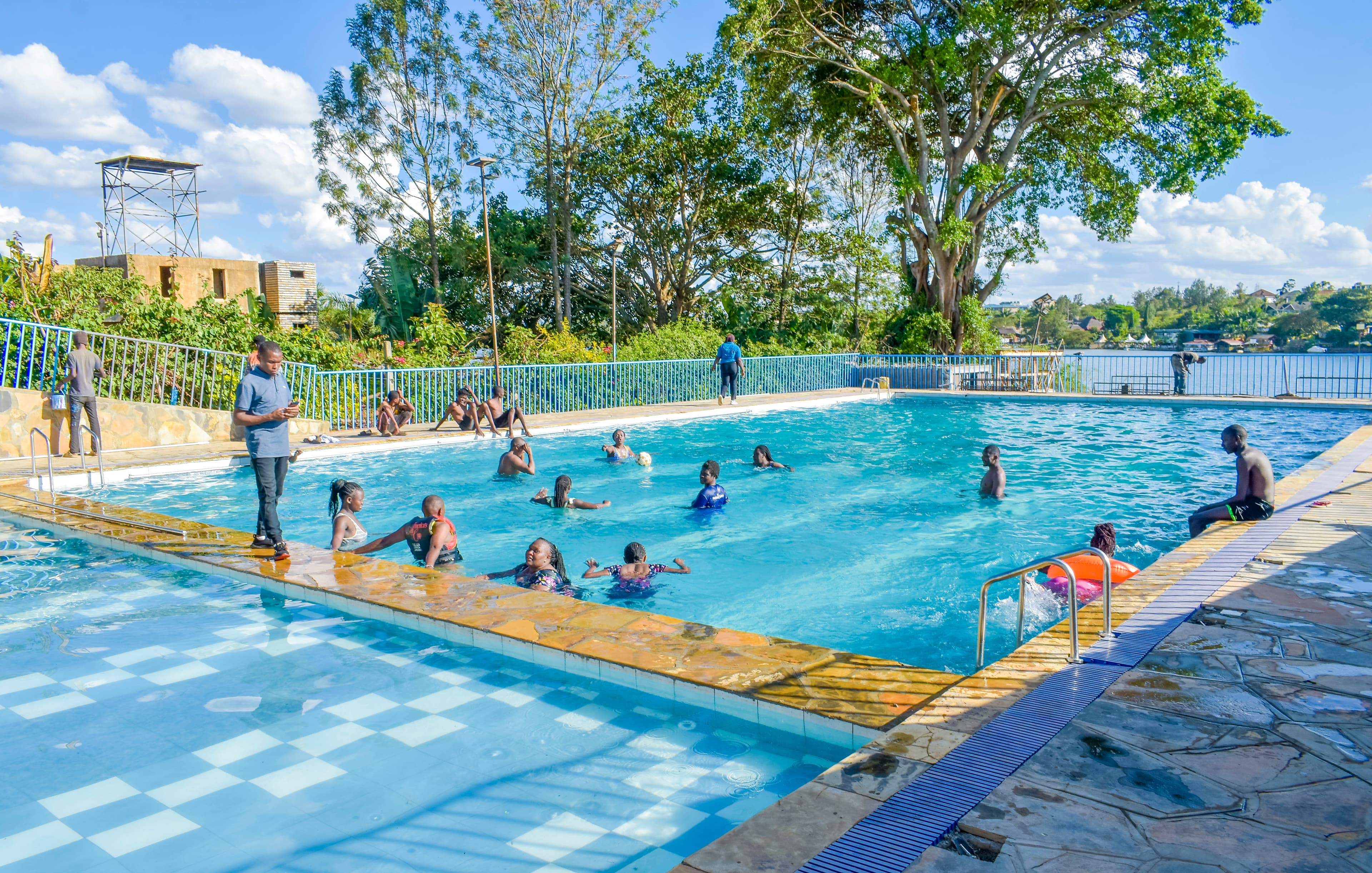 Sparkling pool and lush gardens at Teliza Beach Gardens
